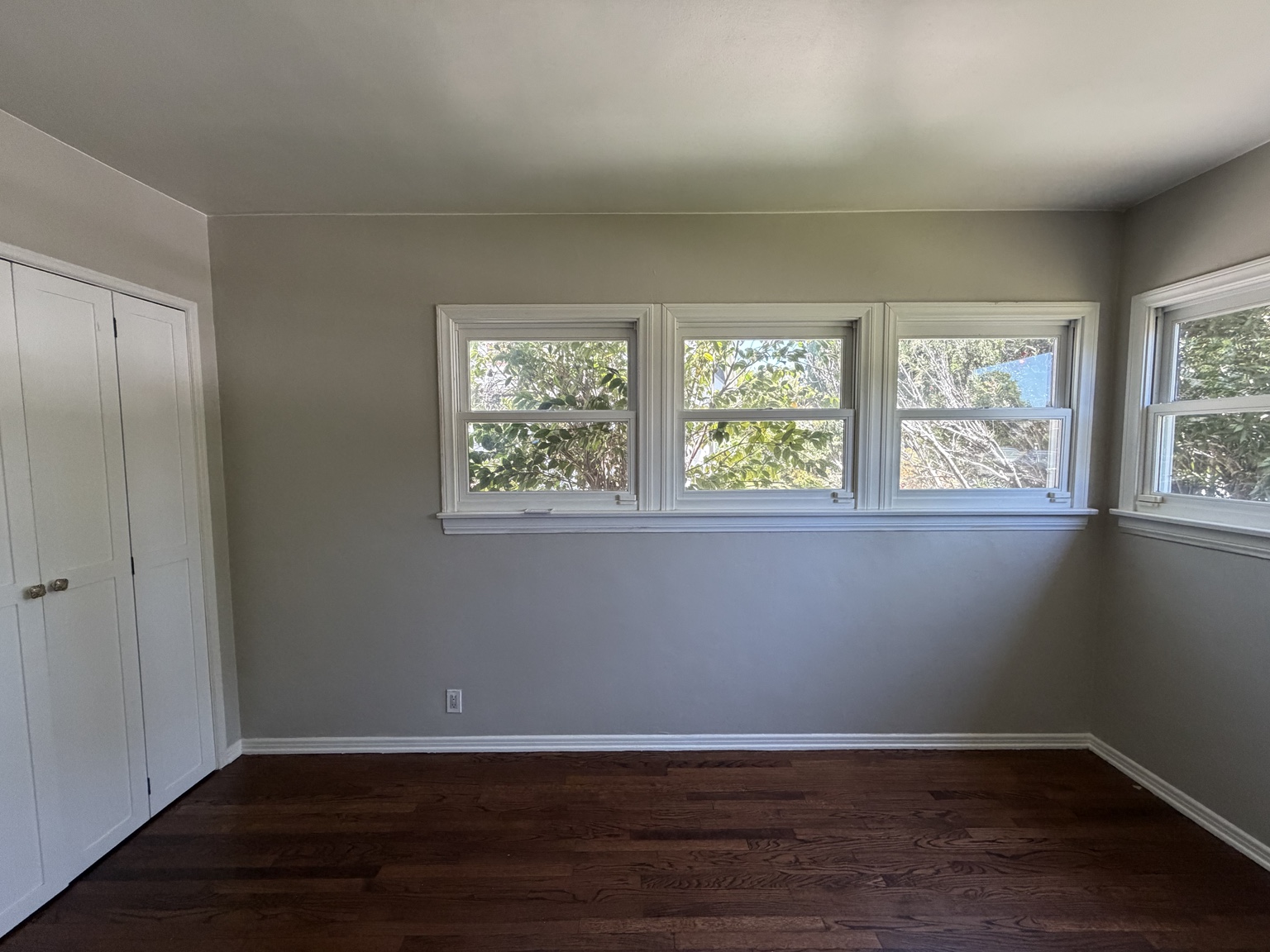 Room after painting with gray walls and white trim